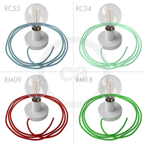 Spostaluce, the white metal light source with fabric cable and side holes