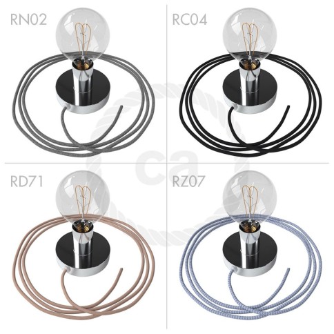 Spostaluce, the chromed metal light source with fabric cable and side holes