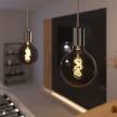 Pendant lamp with textile cable and metal details