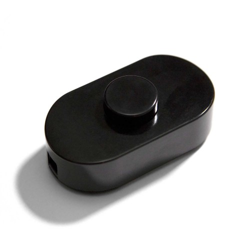 Unipolar foot switch Black with screw terminals. Designed by Achille Castiglioni